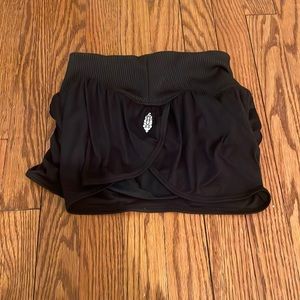 few people movement black athletic shorts